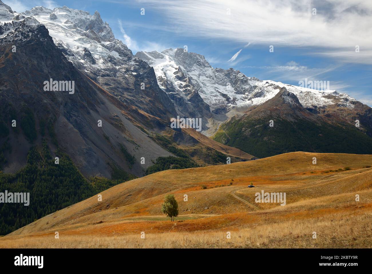 General view of the Meije Peak in Ecrins National Park, Romanche Valley, Hautes Alpes (French Southern Alps), France, with Autumn colors Stock Photo