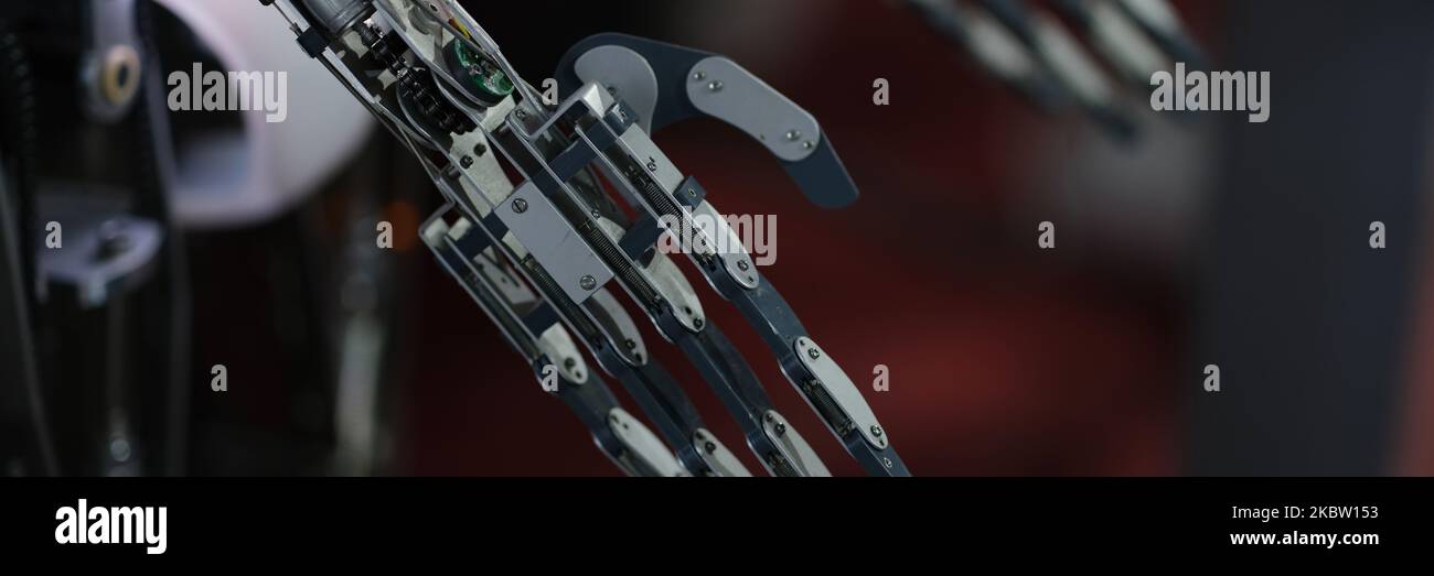 Robot arm and machine learning of contact and consciousness Stock Photo