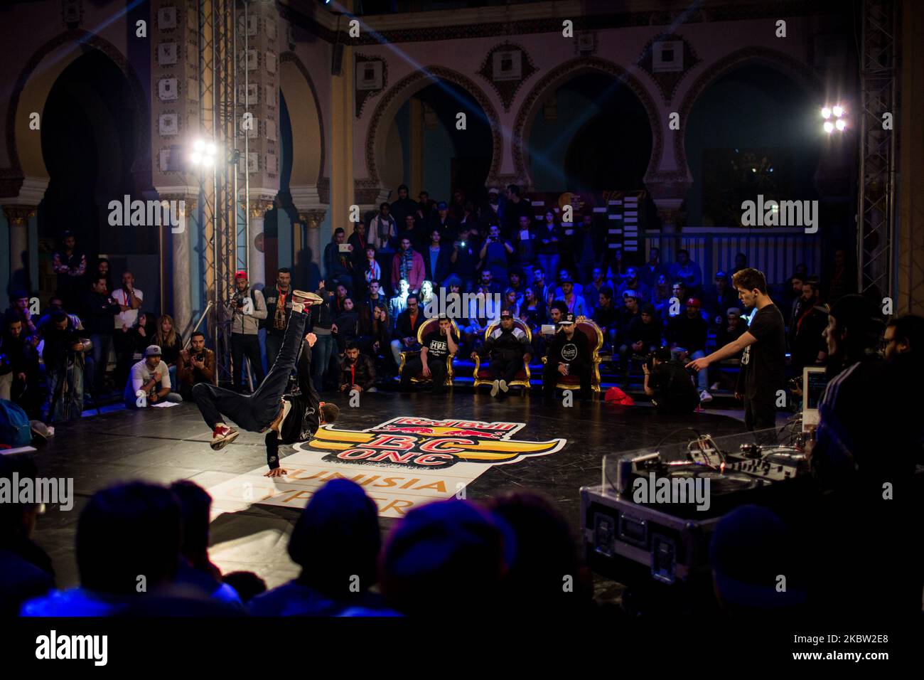 Carthage, Tunisia, 21 March 2015. B-boys during an international breakdance competition in an old roman building. More and more hip-hop associations are granted the right to organised events in such spectacular places. (Photo by Emeric Fohlen/NurPhoto) Stock Photo