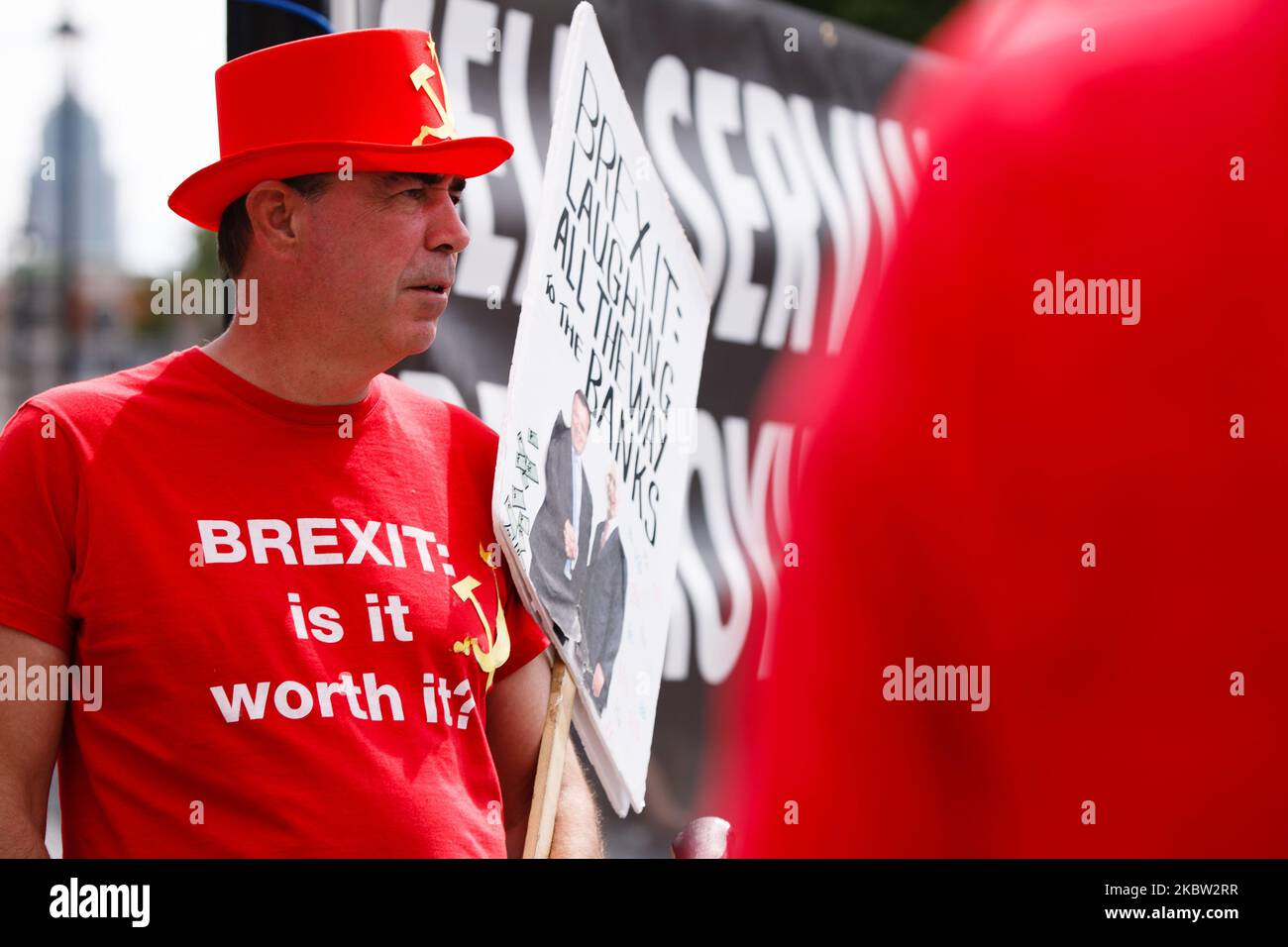 Anti-Brexit activist Steve Bray, wearing a hat and t-shirt featuring a hammer and sickle, demonstrates outside the Houses of Parliament in London, England, on July 22, 2020. Yesterday saw the publication of the long-awaited Intelligence and Security Committee (ISC) report on Russian activity in the UK, which includes among its assertions the claim that the British government 'actively avoided' investigating possible Russian interference in the 2016 referendum on EU membership. (Photo by David Cliff/NurPhoto) Stock Photo