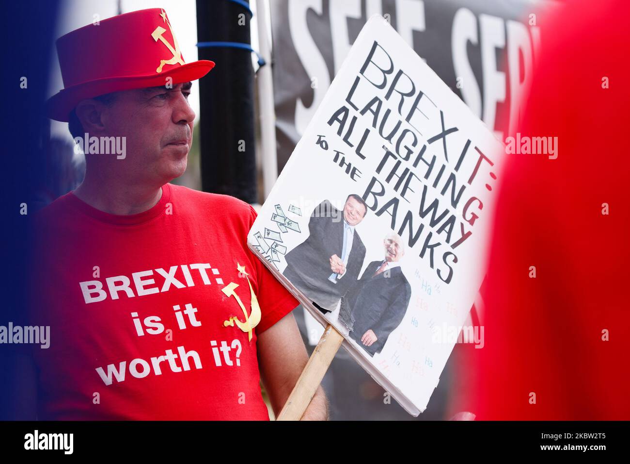 Anti-Brexit activist Steve Bray, wearing a hat and t-shirt featuring a hammer and sickle, demonstrates outside the Houses of Parliament in London, England, on July 22, 2020. Yesterday saw the publication of the long-awaited Intelligence and Security Committee (ISC) report on Russian activity in the UK, which includes among its assertions the claim that the British government 'actively avoided' investigating possible Russian interference in the 2016 referendum on EU membership. (Photo by David Cliff/NurPhoto) Stock Photo