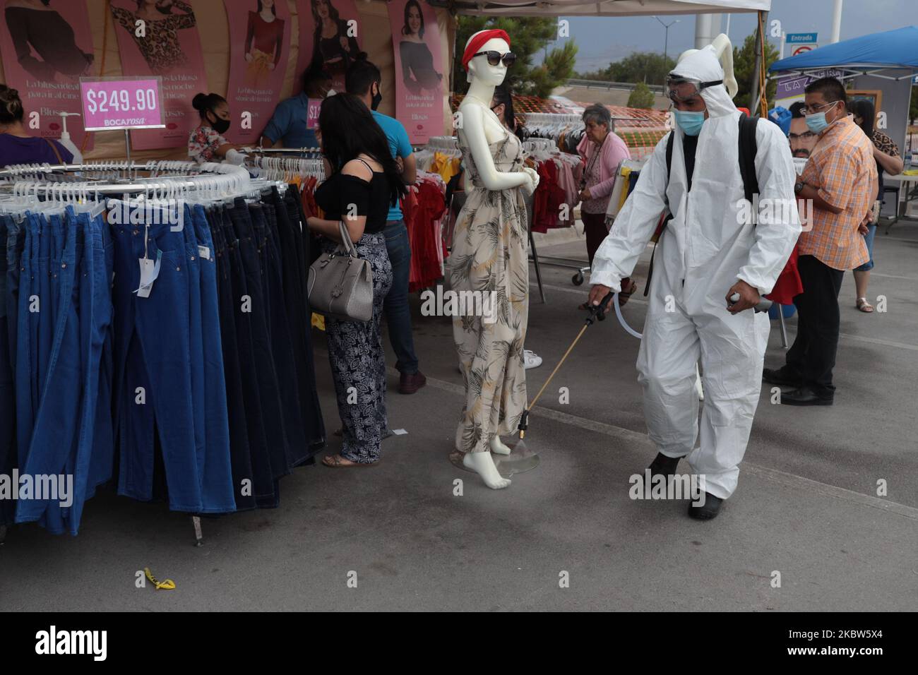 Workers sanitize the streets of Ciudad Juarez, Mexico, on July 24, 2020