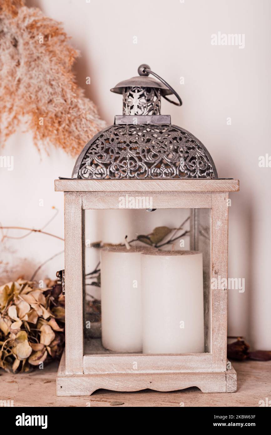 Wooden lantern with a candle inside. Home decorations Stock Photo Alamy