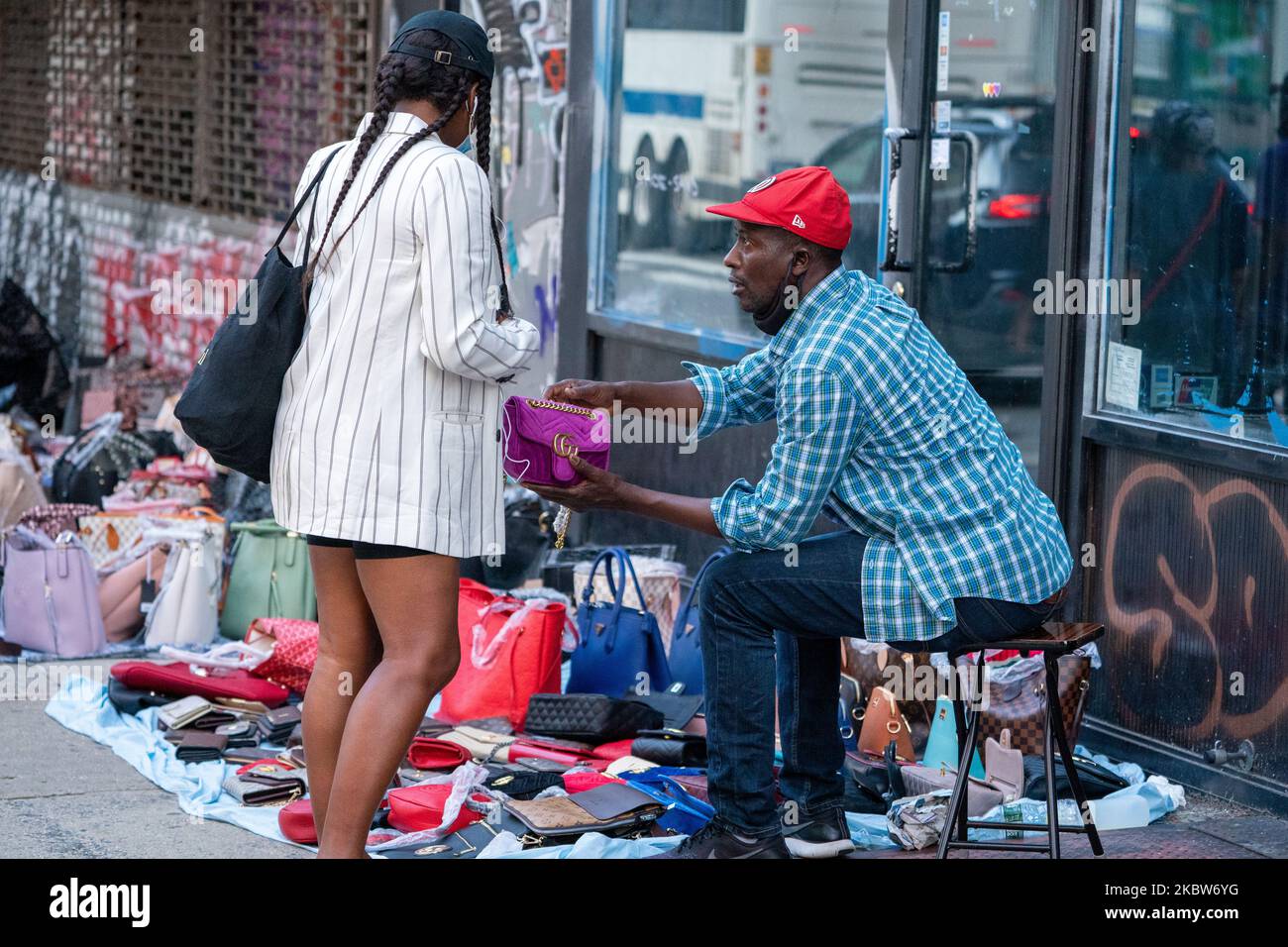 Vendors selling luxury brands knockoffs along Canal Street as New York