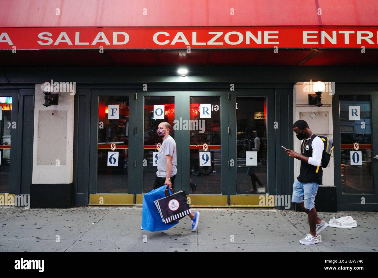 A view of a closed Sbarro Times Square as New York City enters Phase 4 of re-opening following restrictions imposed to slow the spread of coronavirus on July 25, 2020 in New York City. The fourth phase allows outdoor arts and entertainment, sporting events without fans and media production. (Photo by John Nacion/NurPhoto) Stock Photo