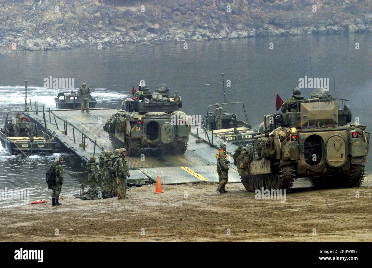 US Military engineers installation floating bridge during an annual