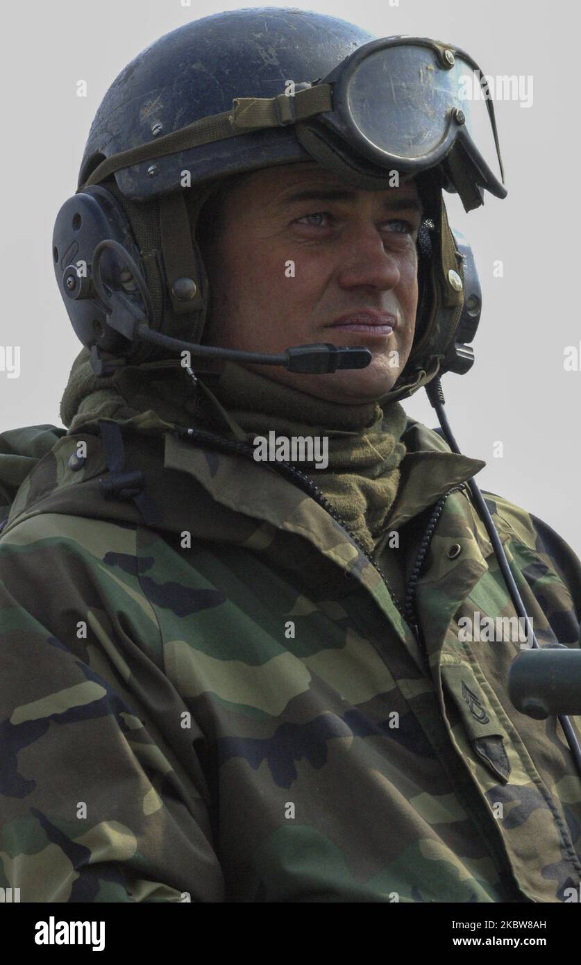 US Military tank driver wait for next order during an joint exercise
