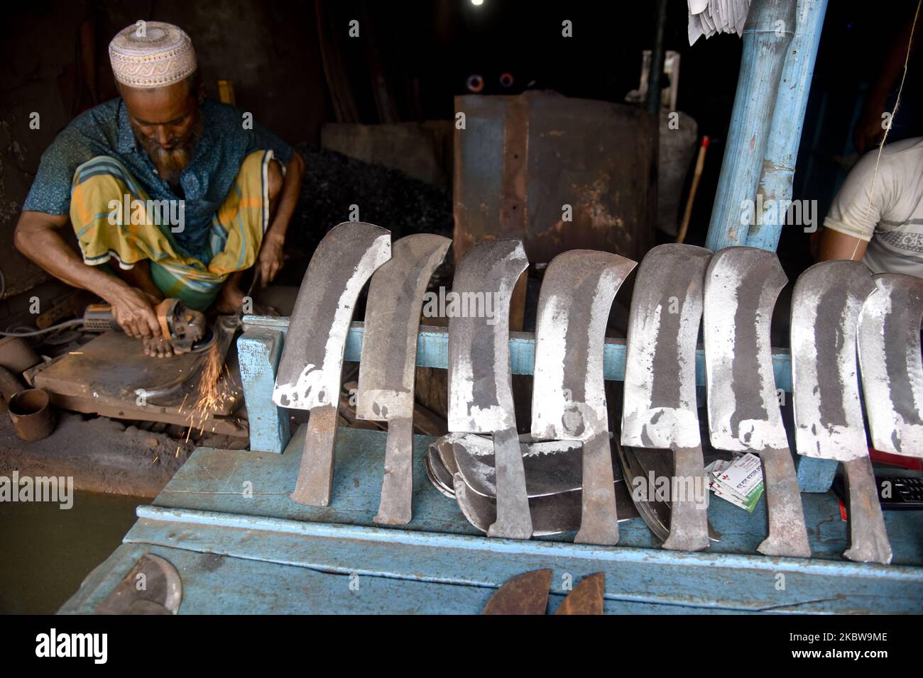 Bangladeshi knife sellers hires stock photography and images Alamy
