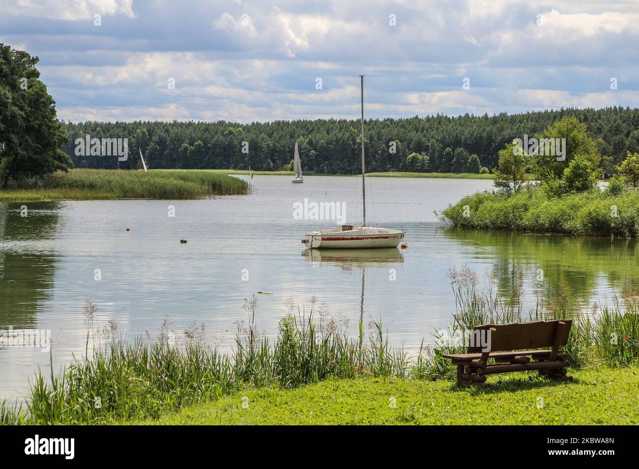 General view of the Jelenie lake is seen in Wdzydze Kiszewskie, Poland on 25 July 2020 Due to the coronavirus pandemic, the vast majority of Poles spend their holidays in their own country. The Baltic Sea, Kashubia, Masuria and the mountains are popular. People spend their holidays in motorhomes, caravans and rented holiday homes. (Photo by Michal Fludra/NurPhoto) Stock Photo