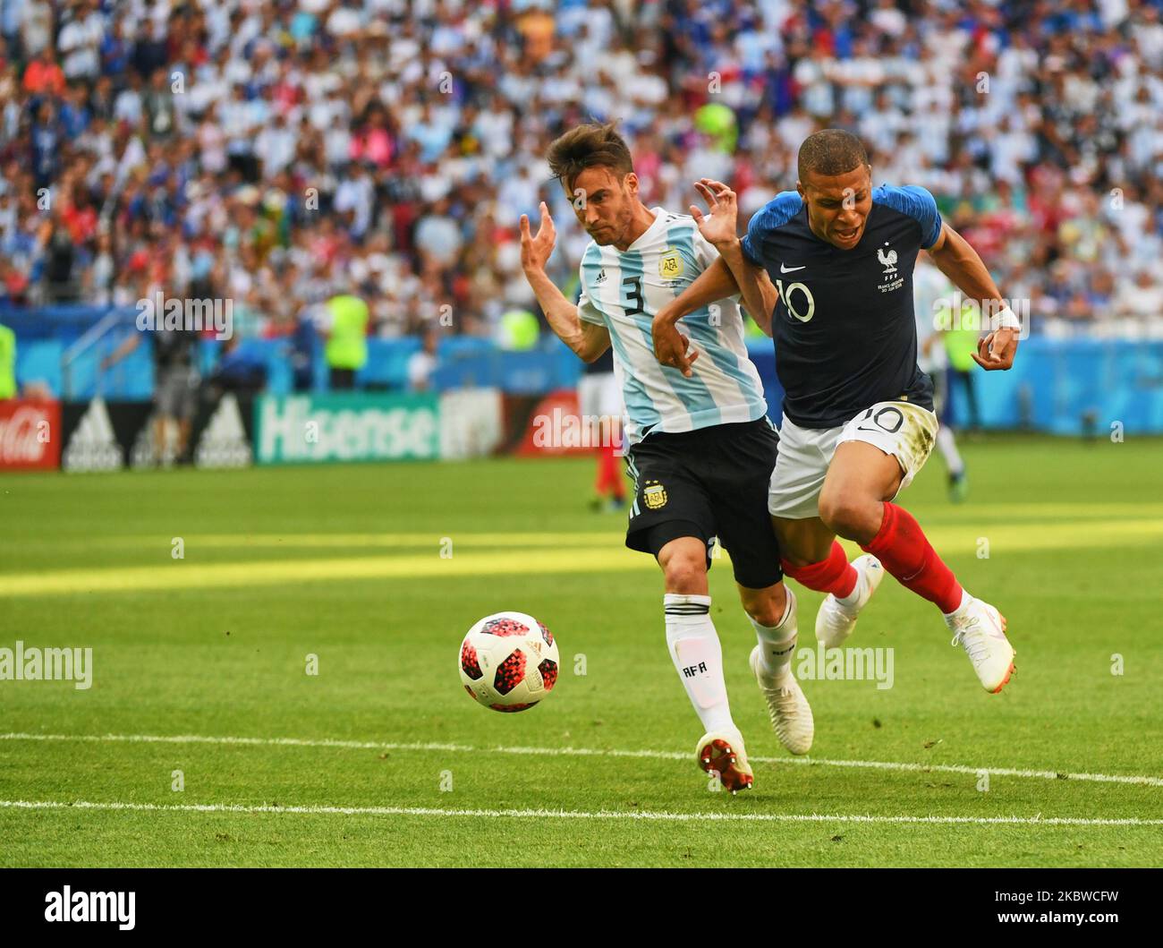 Kylian Mbappe of France and Nicolas Tagliafico of Argentina and Marcos Rojo of Argentina during the FIFA World Cup match France versus Argentina at Kazan Arena, Kazan, Russia on June 30, 2018. (Photo by Ulrik Pedersen/NurPhoto) Stock Photo