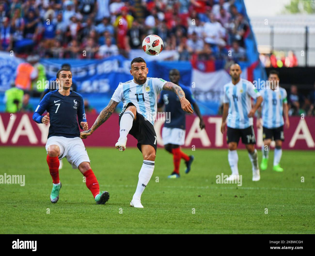 Nicolas Otamendi of Argentina kicking the ball away in front of Antoine Griezmann of France during the FIFA World Cup match France versus Argentina at Kazan Arena, Kazan, Russia on June 30, 2018. (Photo by Ulrik Pedersen/NurPhoto) Stock Photo