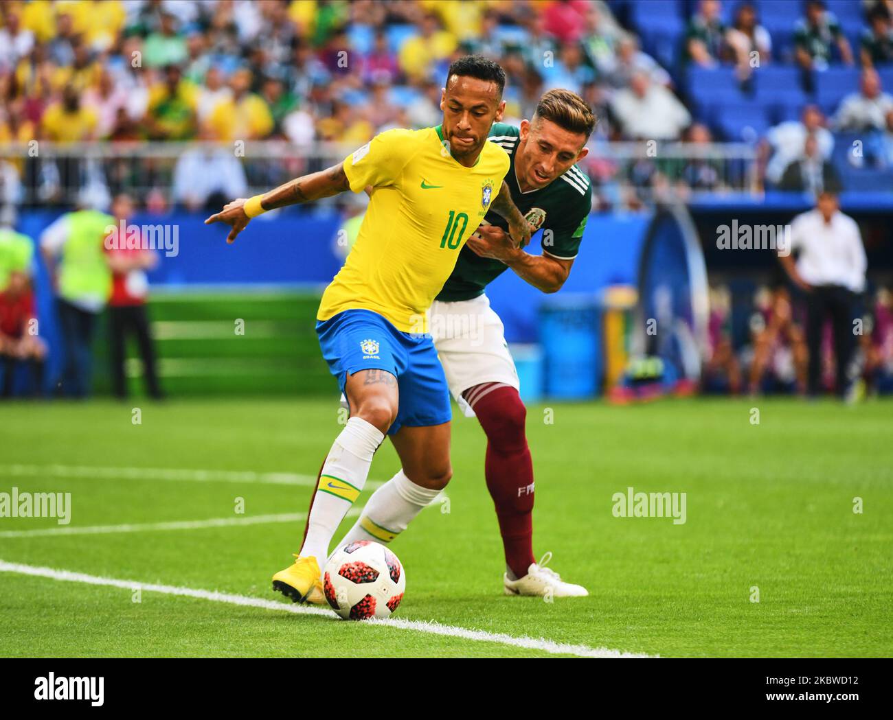 Neymar of Brazil dribbling in front of Hector Herrera of Mexico during the FIFA World Cup match Brazil versus Mexico at Samara Arena, Samara, Russia on July 2, 2018. (Photo by Ulrik Pedersen/NurPhoto) Stock Photo