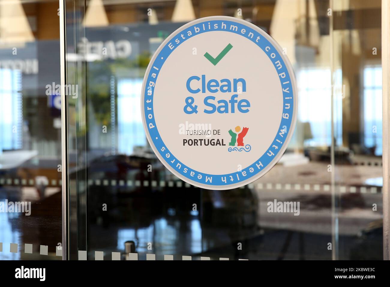 A Clean and Safe stamp is seen at a Hotel door in Portimao, Algarve region, Portugal on July 29, 2020. Considering the widespread concern in the resumption of economic and social activity, Turismo de Portugal created a Clean and Safe stamp of approval to distinguish tourist activities which are compliant with hygiene and cleaning requirements for the prevention and control of COVID-19 and other possible infections. (Photo by Pedro FiÃºza/NurPhoto) Stock Photo
