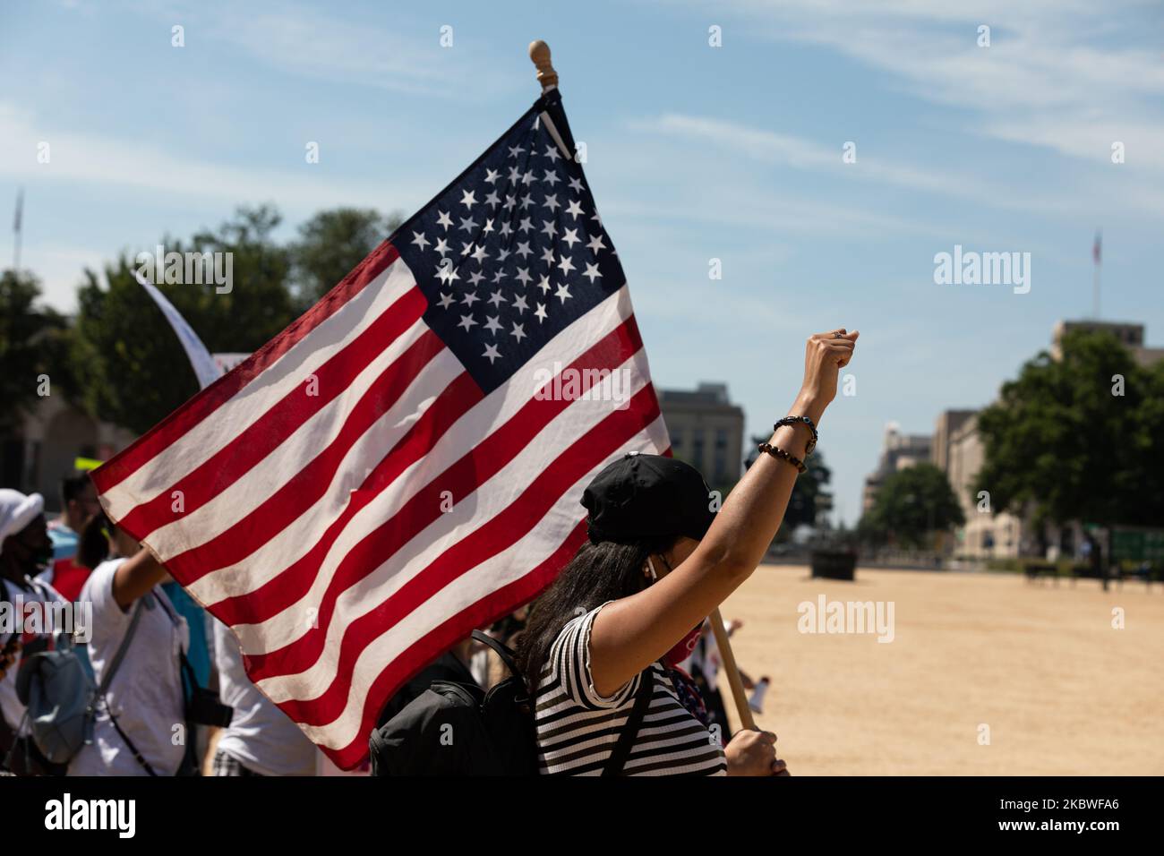 U.S. Army Private First Class Vanessa Guillen's supporters are seen to demand for justice in Vanessa's death during a rally on the National Mall in front of the U.S. Capitol July 30, 2020 in Washington, DC. (Photo by Aurora Samperio/NurPhoto) Stock Photo