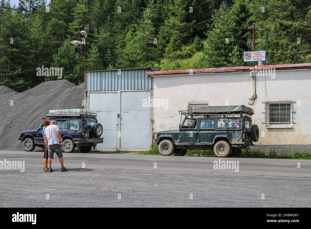 Two 4x4 expedition cars parked on the side of the road are seen in Slovak Paradise - a mountain range in eastern Slovakia, part of the Spis-Gemer Karst, a part of the Slovak Ore Mountains, a major subdivision of the Western Carpathians in Dedinky, Slovakia on 31 July 2020 (Photo by Michal Fludra/NurPhoto) Stock Photo