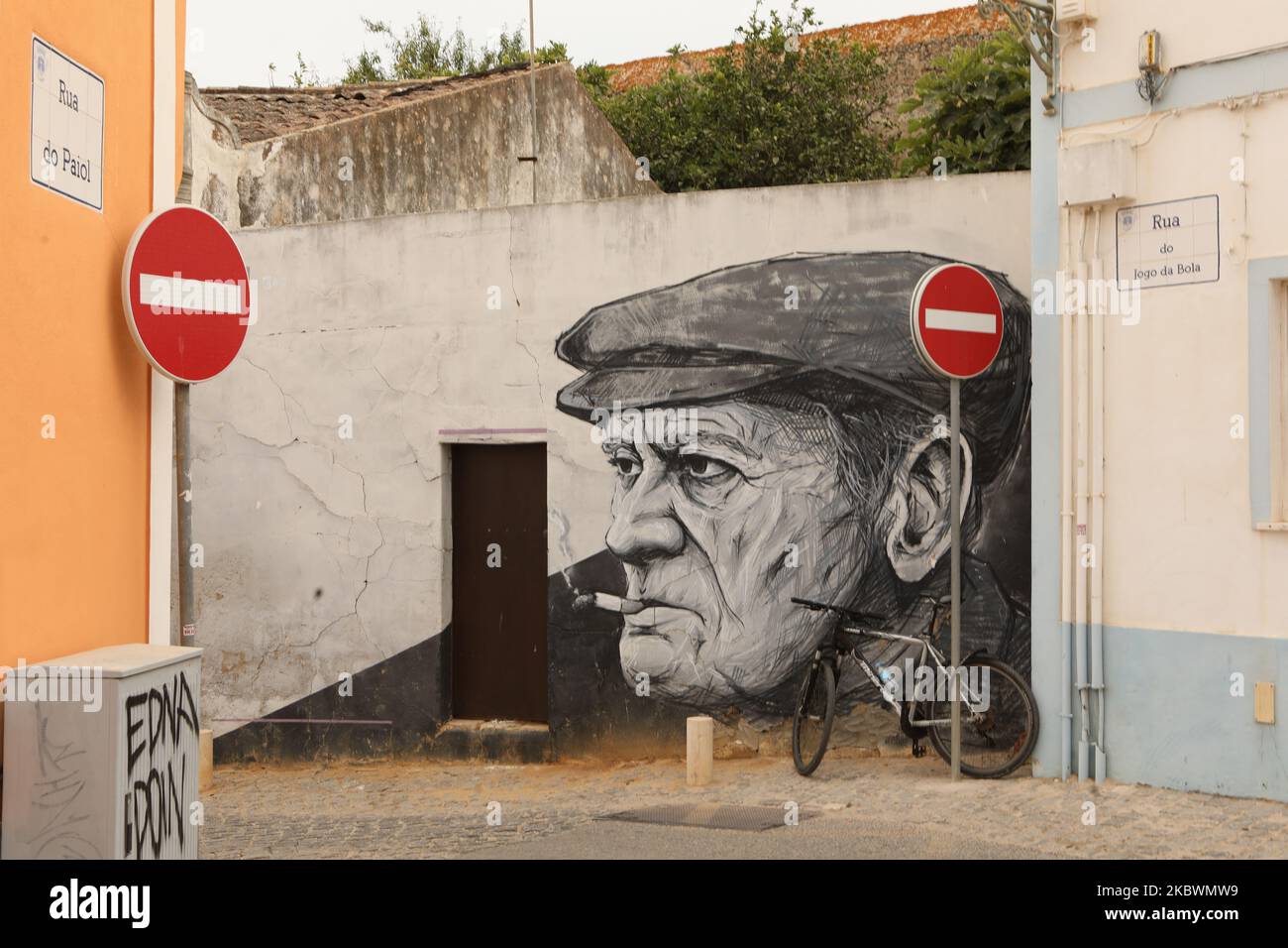 The smoking man mural, Lagos, Algarve, Portugal Stock Photo