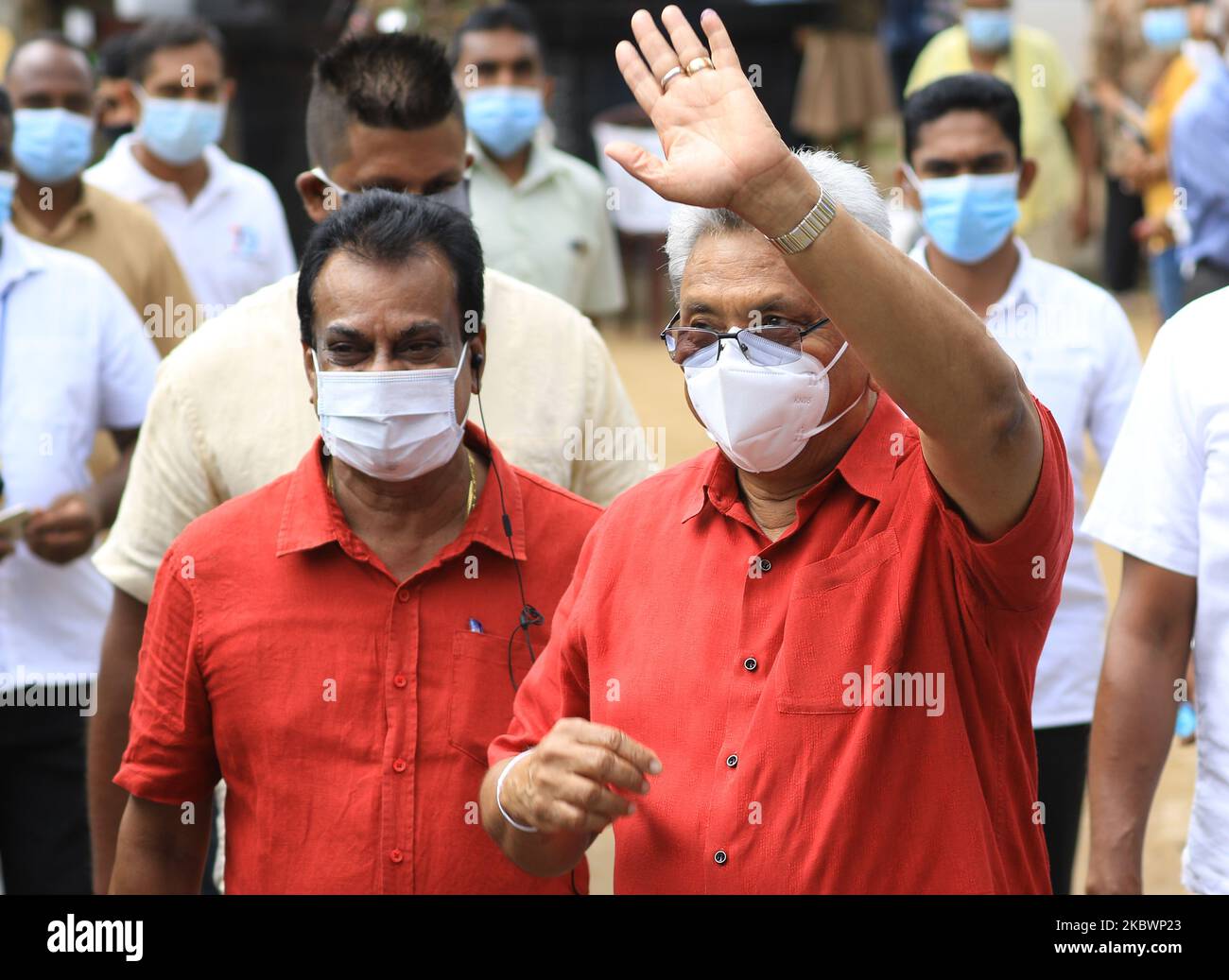 Face mask gestures hi-res stock photography and images - Alamy