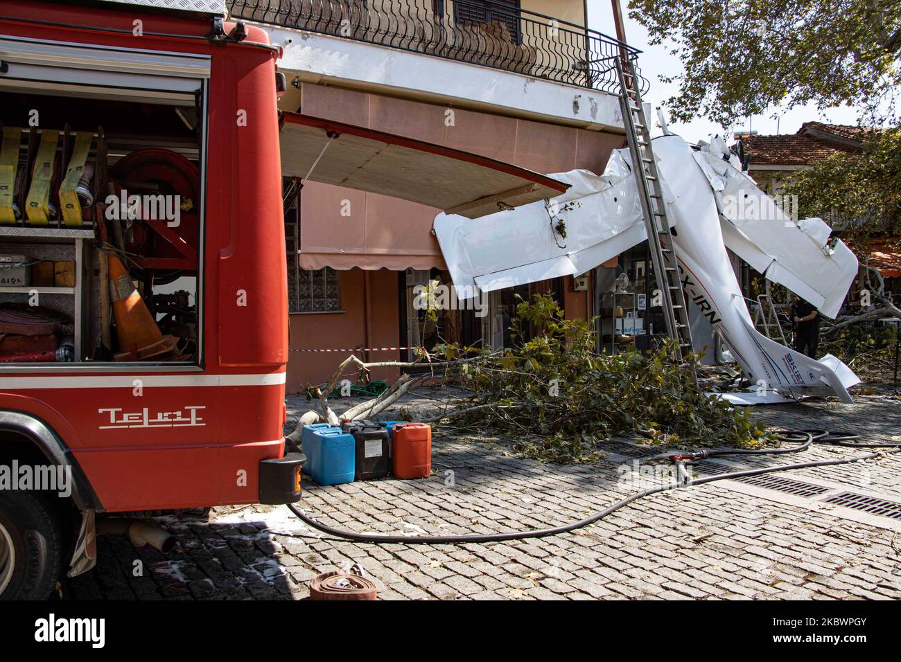 A small light aircraft of general aviation had an accident as it smashed onto a building in Proti Town in Serres region, after crashed hitting a tree, smashing the cockpit but the pilot survived with light injuries and was taken to hospital. The single-propeller airplane was an Italian made Tecnam P2008 model ( Tecnam P2008-JC Mk2 )with the registration SX-IRN belonging to SKIES AVIATION ACADEMY and the pilot was a student of the school flying his solo mission with low altitude flight. On August 3, 2020 in Proti Serron, Greece. (Photo by STR/NurPhoto) Stock Photo