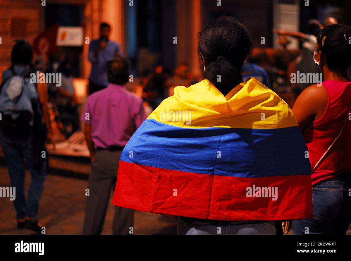 Citizens of the Santiago de Cali, Colombia on August 5, 2020 came out to demonstrate and support the decision of the Supreme Court of Justice by giving former President Alvaro Uribe Velez a house for jail. Detractors of the senator celebrated the historic moment for Colombian politics. (Photo by Eddwin Rodriguez/NurPhoto) Stock Photo