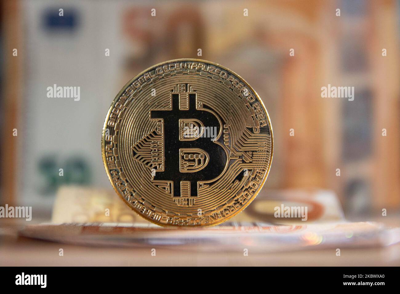 Physical Bitcoin gold coin with text made out of letter tiles.  Cryptocurrency decline or bear market. Copy space in the top right corner  Stock Photo - Alamy