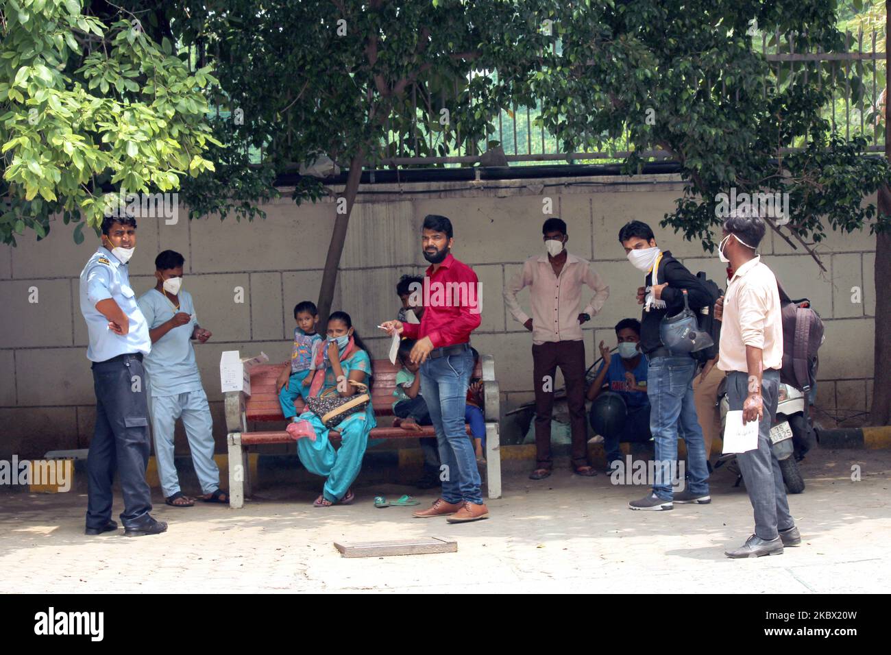 Patients wait for results after giving swab samples for Rapid Antigen Test (RAT) for the COVID-19 coronavirus at Chacha Nehru Bal Chikitsalaya near Geeta Colony in New Delhi on August 11, 2020. For the past seven days, India's single-day count of Covid-19 cases has been more than that of the US and Brazil, the two worst-hit nations in terms of infections, according to an analysis of WHO data. India, the third worst-hit nation in terms of infections, has also accounted for over 23 per cent of the cases and more than 15 per cent of the deaths reported worldwide between August 4-10. (Photo by May Stock Photo