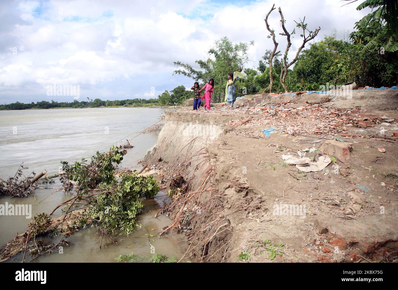 A view of a damaged village due the river erosion in Kharagandhi, Bangladesh, on August 16, 2020. Many villagers have lost their home, land, and livelihood due the natural disaster. The villagers claimed no authority of government came to rescue or help them in this situation. (Photo by Sony Ramany/NurPhoto) Stock Photo
