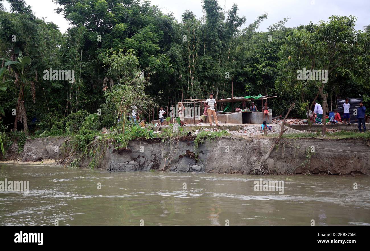 A view of a damaged village due the river erosion in Kharagandhi, Bangladesh, on August 16, 2020. Many villagers have lost their home, land, and livelihood due the natural disaster. The villagers claimed no authority of government came to rescue or help them in this situation. (Photo by Sony Ramany/NurPhoto) Stock Photo