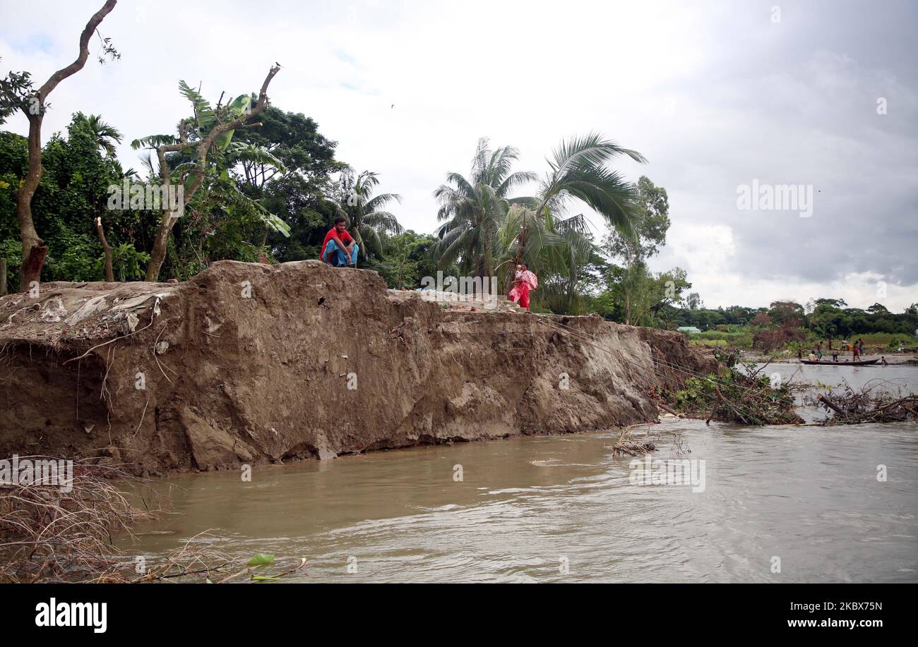 A view of a damaged village due the river erosion in Kharagandhi, Bangladesh, on August 16, 2020. Many villagers have lost their home, land, and livelihood due the natural disaster. The villagers claimed no authority of government came to rescue or help them in this situation. (Photo by Sony Ramany/NurPhoto) Stock Photo