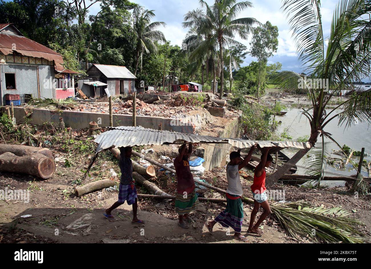 A view of a damaged village due the river erosion in Kharagandhi, Bangladesh, on August 16, 2020. Many villagers have lost their home, land, and livelihood due the natural disaster. The villagers claimed no authority of government came to rescue or help them in this situation. (Photo by Sony Ramany/NurPhoto) Stock Photo