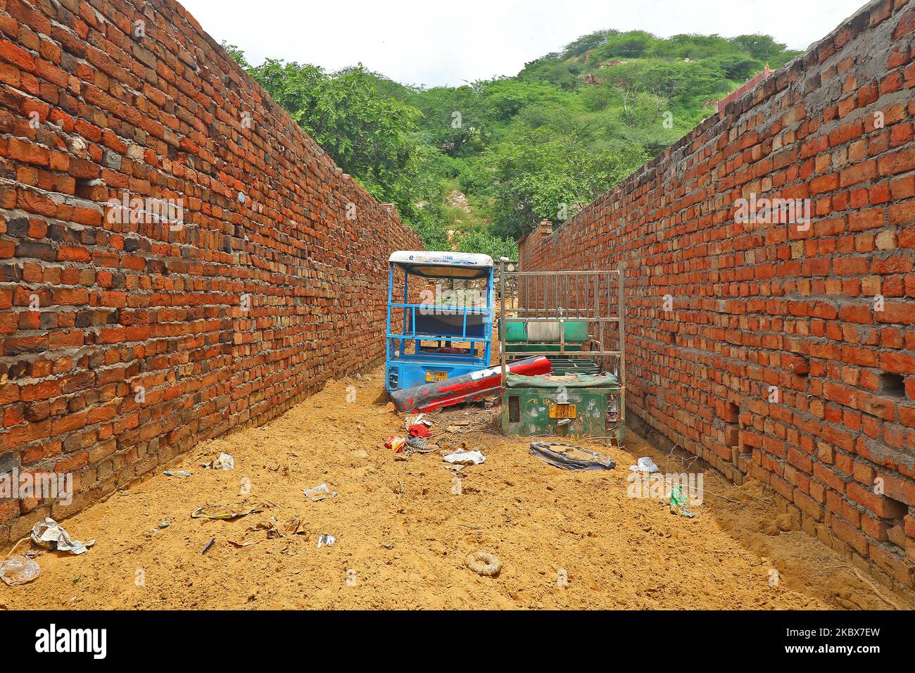 Vehicles submerged in mud as landslide brought in sand to low laying ...