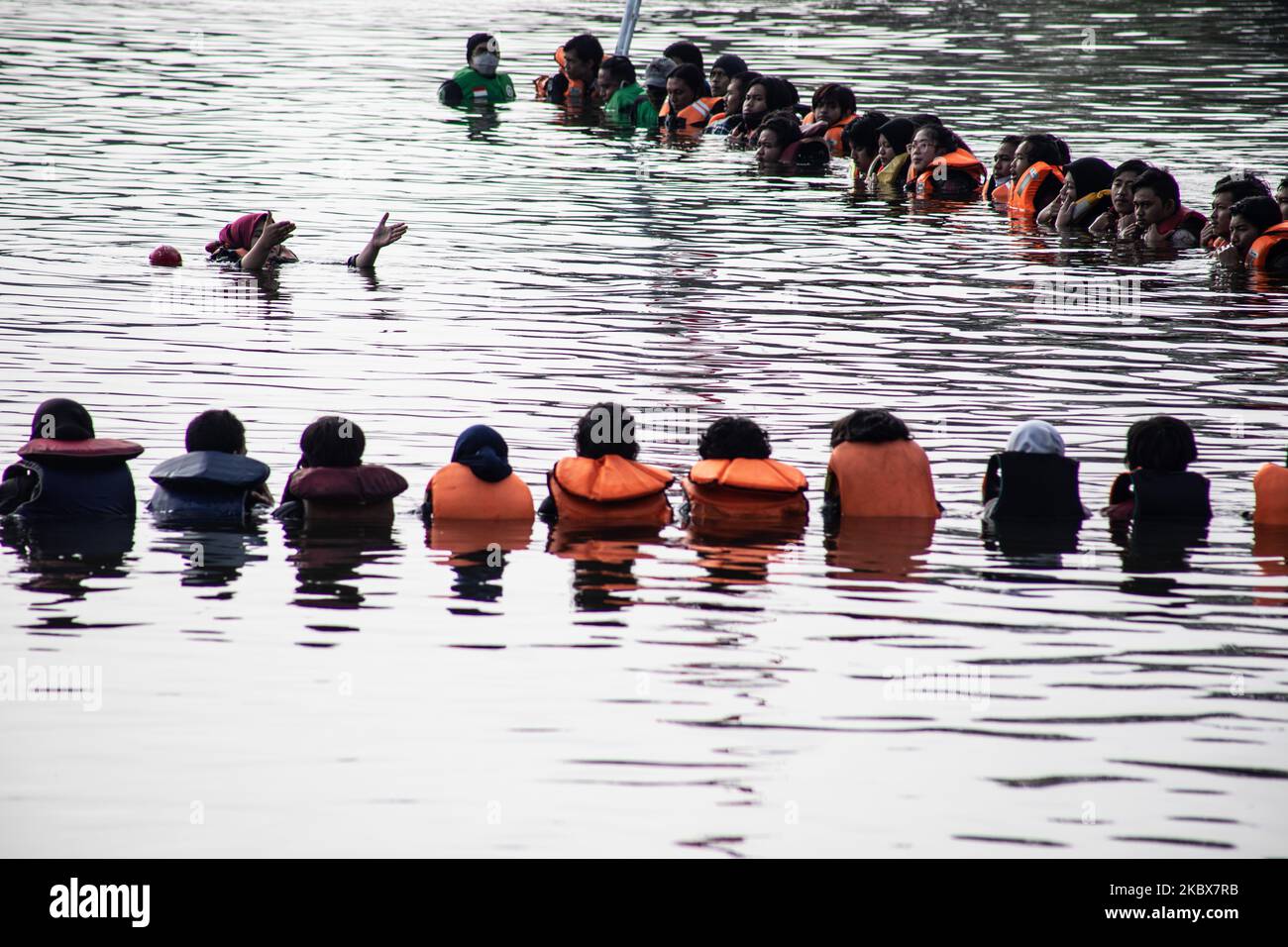 Ceremonial of Flag Rising at Pamulang Lake, South Tangerang, Banten, Indonesia held on August 17, 2020 to comemorate Indonesia 75th Independence Day. During Pandemi Situation People still held Independence day ceremonial in the country. (Photo by Donal Husni/NurPhoto) Stock Photo