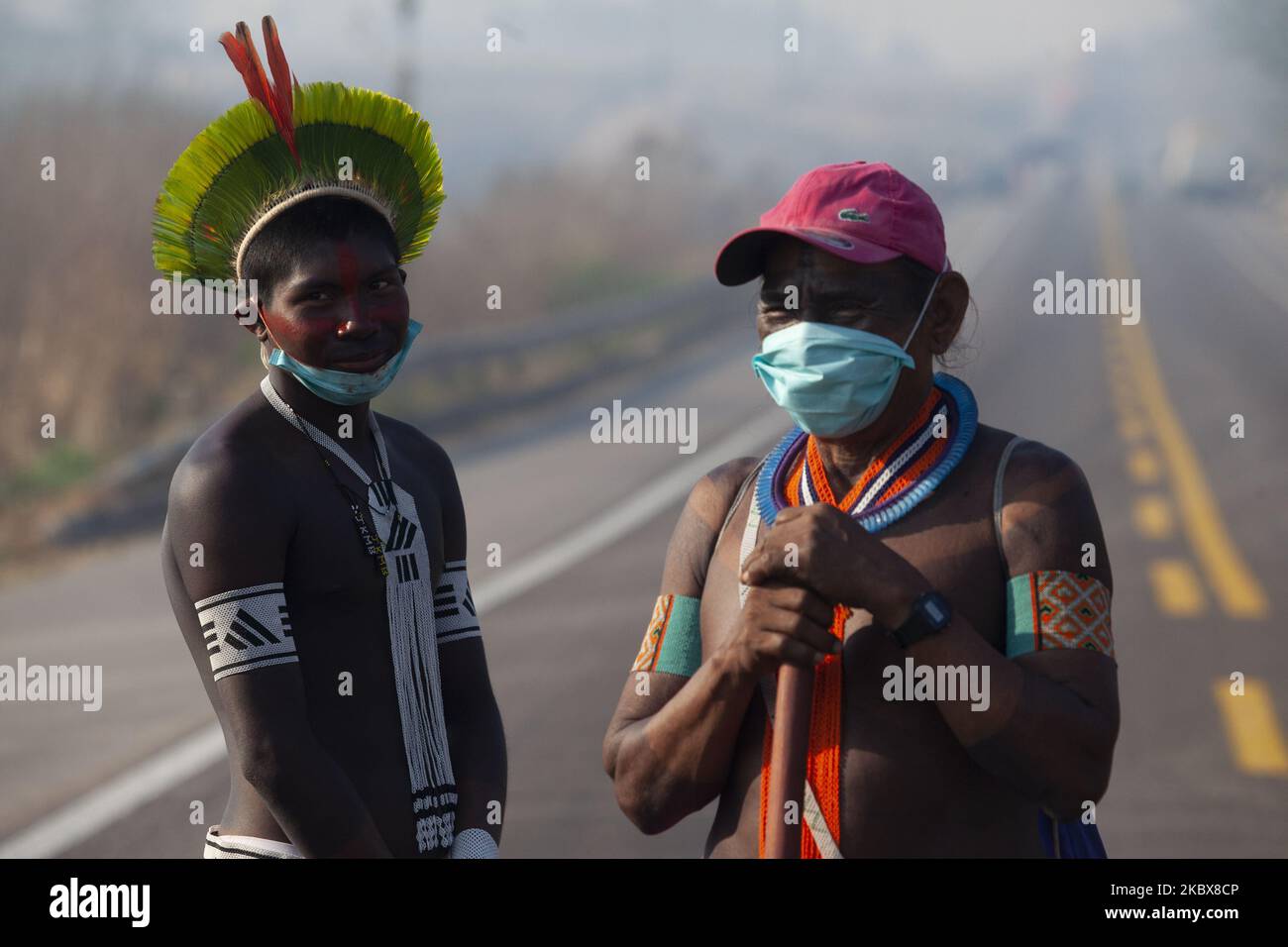 Kayapó indigenous people from the 'Baú' and 'Menkragnoti' villages, near the city of Novo Progresso, in the south of Pará, Brazil, on August 17, 2020 , block the BR-163 highway in protest against the lack of resources to combat COVID-19, and claiming dialogue by part of the government in the plans of the Ferrogrão, a railway project for transporting grains between connecting the Midwest region to the port of Mirituba, in the north of the state of Pará, on Monday morning, on August 17, 2020. (Photo by Ernesto Carriço/NurPhoto) Stock Photo