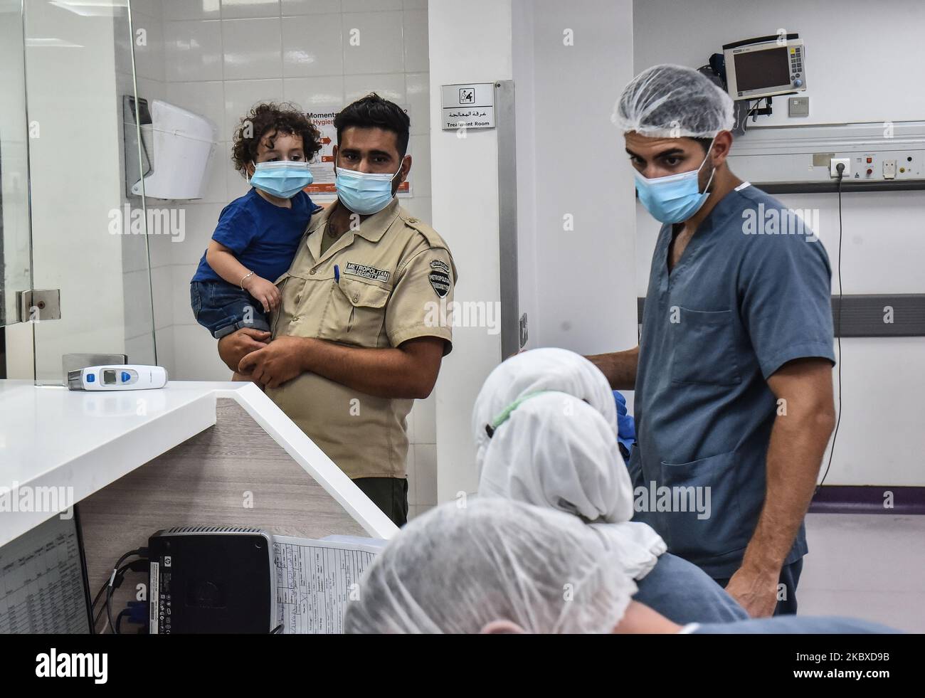 People at Rafic Hariri University Hospital in Beirut, Lebanon, on August 11, 2020 during the COVID-19 lockdown. Lebanon started a two-week coronavirus lockdown on Friday, as the country’s health minister described the situation as “dangerous and sensitive”. (Photo by STR/NurPhoto) Stock Photo