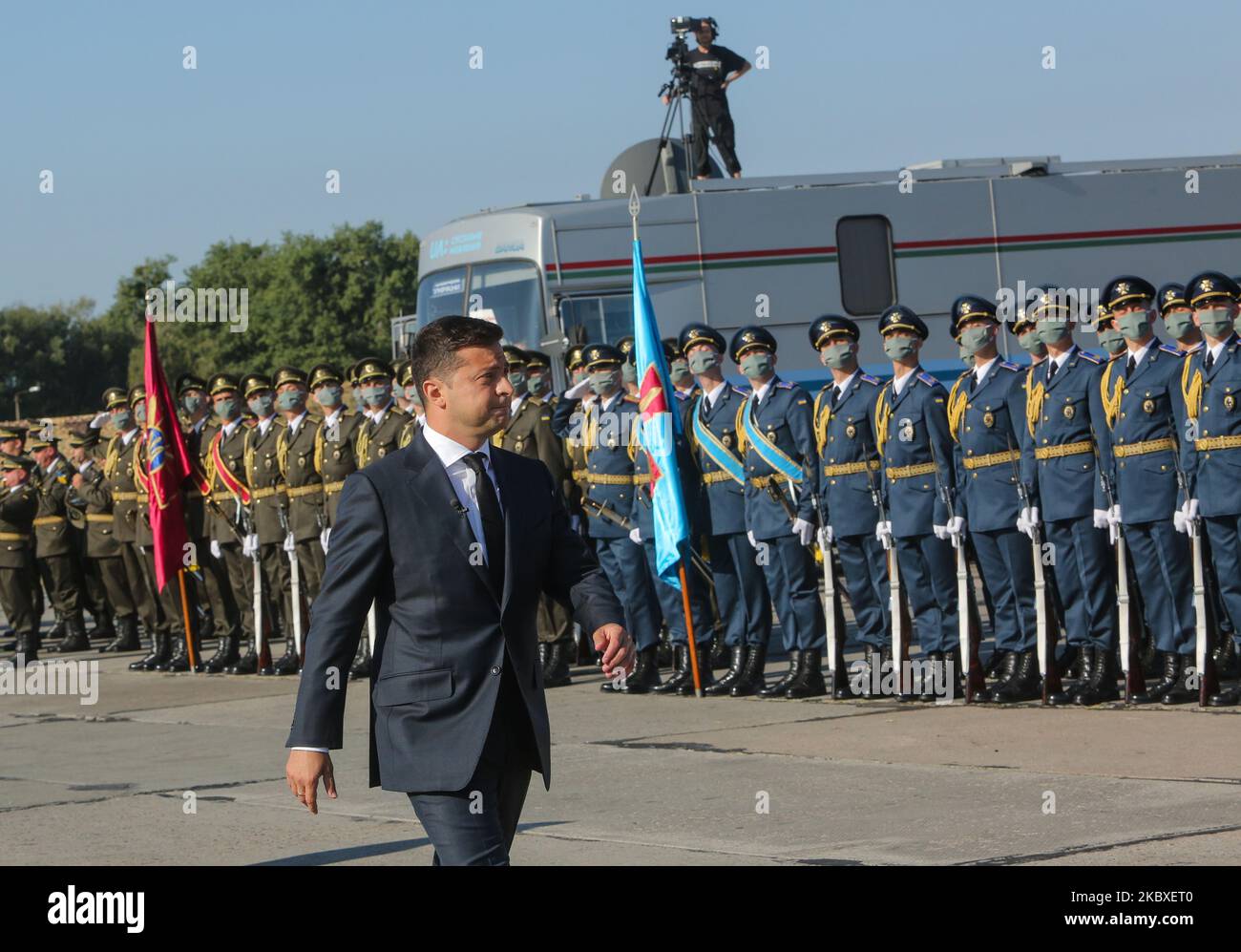 President Volodymyr Zelenskyy walks in front of lined up soldiers as he arrived at Vasylkiv military base near Kyiv, Ukraine, August 23, 2020. Ukraine celebrates The National Flag Day. State authorities visit military base. (Photo by Sergii Kharchenko/NurPhoto) Stock Photo