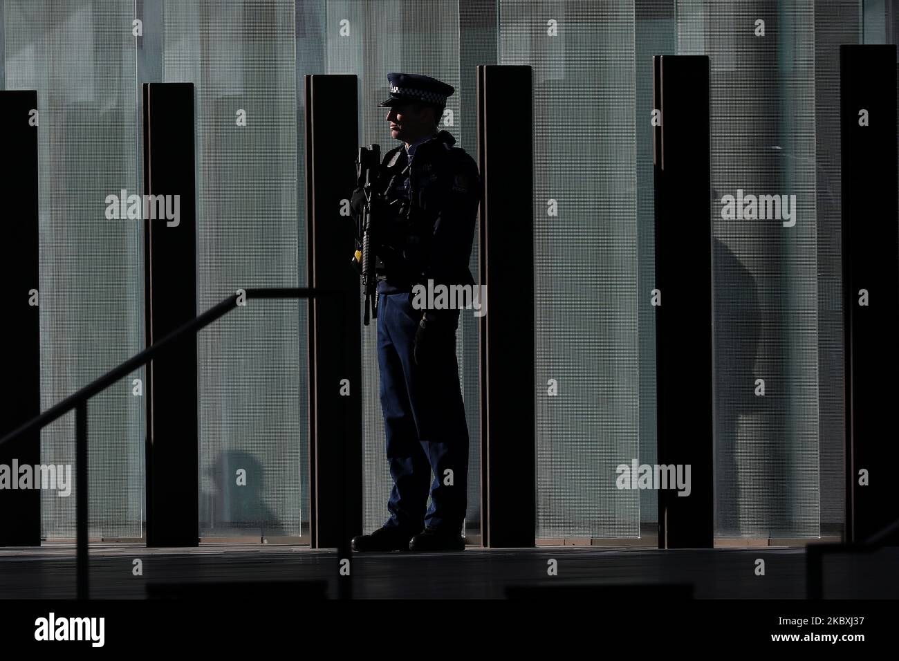 An armed police officer stands guard outside the Christchurch High Court prior to the third day of a four-day sentencing hearing for Brenton Harrison Tarrant in Christchurch, New Zealand, on August 26, 2020. Australian white supremacist Tarrant, 29, who carried out the attack on two mosques on 15 March 2019, will be sentenced on 51 counts of murder, 40 of attempted murder and one charge under the Terrorism Suppression Act. (Photo by Sanka Vidanagama/NurPhoto) Stock Photo