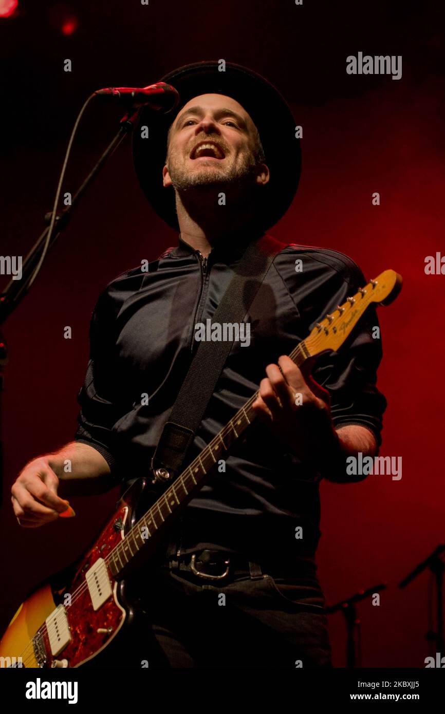 Coldplay band performing live in year the latest album released