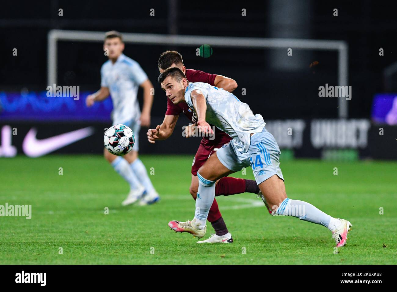 Amer Gojak of Ferencvarosi TC tries to control the ball in front