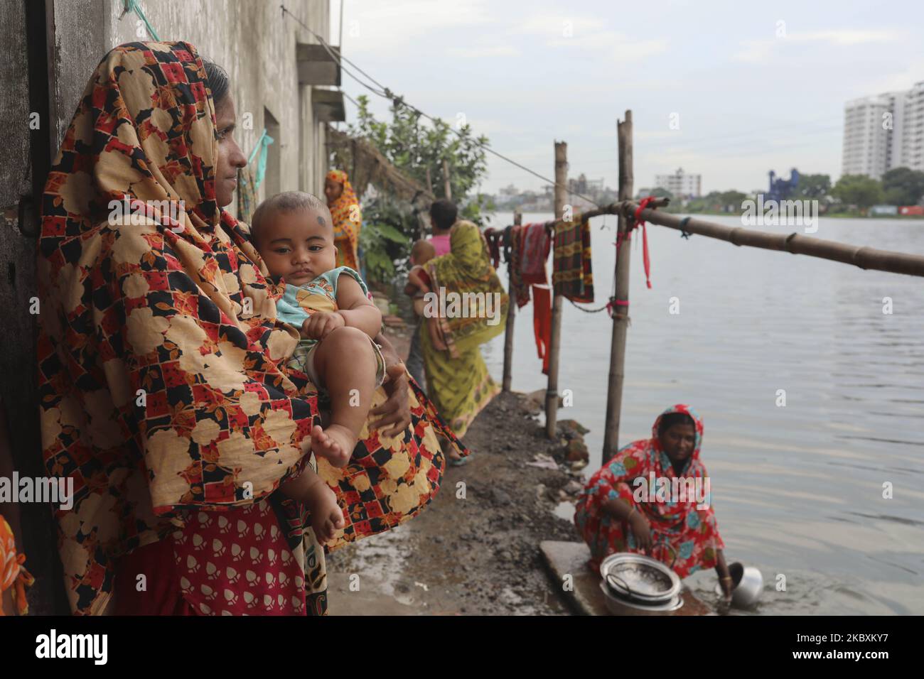 Children and women are vulnerable situation during monsoon at Dhaka Bangladesh on august 27, 2020. (Photo by Kazi Salahuddin Razu/NurPhoto) Stock Photo