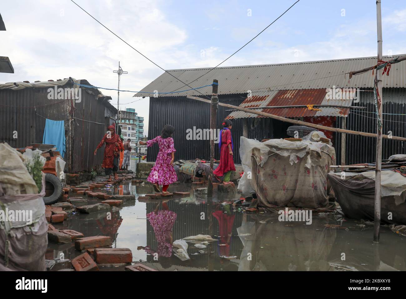 Children and women are vulnerable situation during monsoon at Dhaka Bangladesh on august 27, 2020. (Photo by Kazi Salahuddin Razu/NurPhoto) Stock Photo
