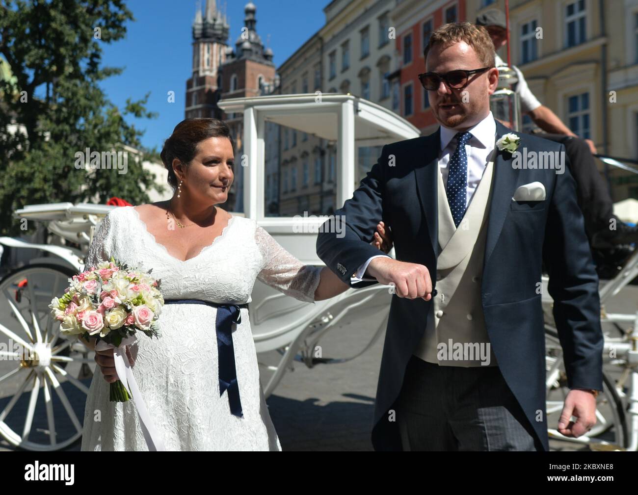 Prince Jan Lubomirski-Lanckoronski and Countess Helena Mankowska on their way to 'Wierzynek' restaurant in Krakow's Main Market Square. Jan Lubomirski-Lanckoronski, who in 2019 was ranked 100th on the list of the '100 richest Poles' was previously married to a Polish businesswoman Dominika Kulczyk, the daughter of a billionaire businessman Jan Kulczyk. They divorced in 2013 after 12 years of marriage. They had two children, Jeremy and Weronika. Due to the coronavirus pandemic, only a handful of closest relatives attended the ceremony. On Friday, August 28, 2020, in Krakow, Lesser Poland Voivod Stock Photo