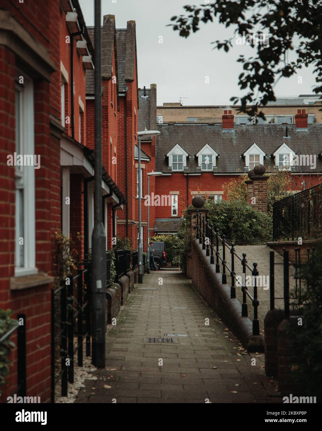 A vertical shot of red brick houses on a beautiful autumn day Stock ...