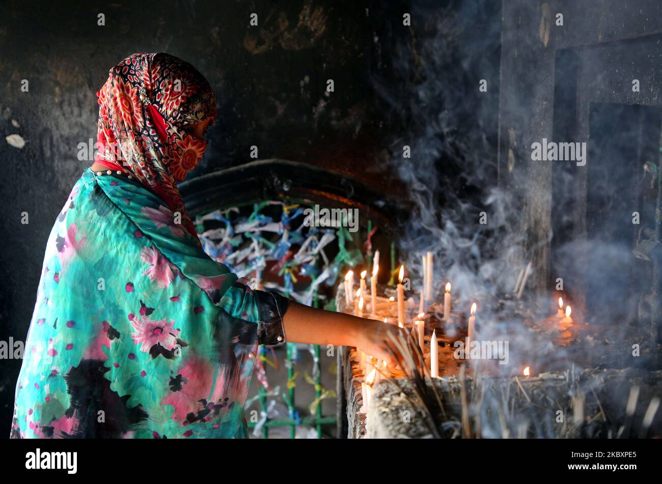 The tenth day of Muharram is celebrated as Ashura, Shia muslims celebrate the day as mourning day for recalling the martyrdom of Prophet Hazrat Muhammad's grandson Hazrat Imam Hussain, his relatives and 72 supporters during the clash of Karbala on this day in the Hijri year of 61, in Dhaka, Bangladesh, on August 29, 2020. To recognize the day, consistently, Shias bring out customary parade known as Tazia in various regions of Bangladesh, including capital Dhaka. The people group plans for the parade and starts their recognition customs a couple of days before the tenth Muharram. But this year  Stock Photo