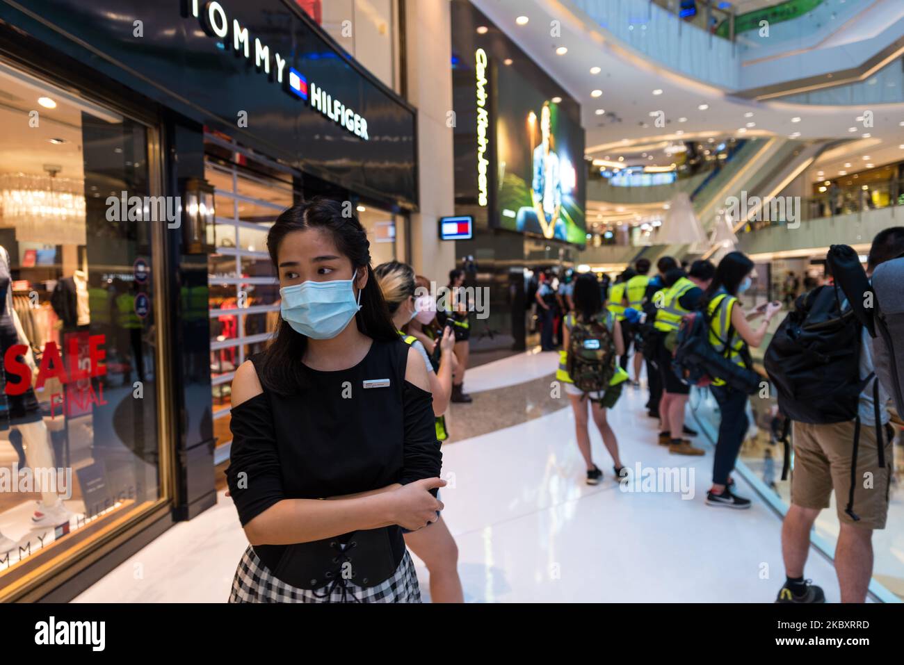 A sales lady watches the situation as shops had to close because of police intervention in Moko mall in Mongkok. In Hong Kong, China, on 30 Aug 2020. (Photo by Marc Fernandes/NurPhoto) Stock Photo