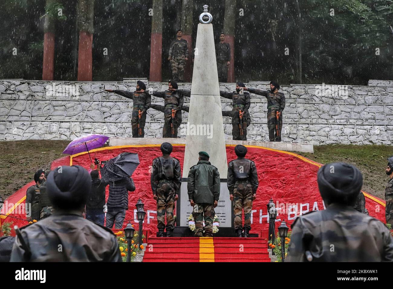 Indian army pays rich tributes to the Martyrs of Haji Pir Pass on the 50th anniversary of its ''victory'' over Pakistan in the 1965 war with a series of events in Baramulla, Jammu and Kashmir, India on 31 August 2020. GOC 19 Infantry Div Major General Virendra Vats was present on the occasion who highlighted the role of local populace during the battle of Haji Pir. The indian army while praying tribute to martyrs also paid tribute to Mohammad Maqbool Shervani (a Kashmiri youth and National Conference member, who delayed the march of Pakhtoon tribesmen from Pakistan and rebel forces in Baramull Stock Photo