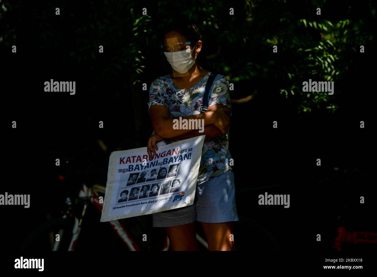 A woman joins a protest in commemoration of National Heroes Day in Quezon City, Metro Manila, Philippines on August 31, 2020.(Photo by Lisa Marie David/NurPhoto) Stock Photo