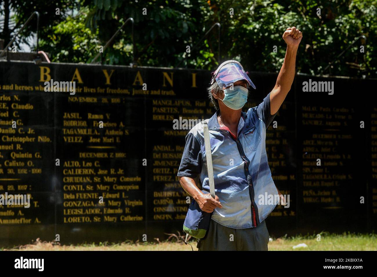 A man raises his closed fist as he joins a protest in commemoration of National Heroes Day in Quezon City, Metro Manila, Philippines on August 31, 2020.(Photo by Lisa Marie David/NurPhoto) Stock Photo