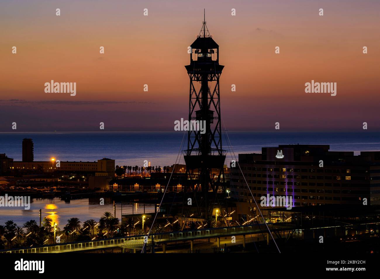 Port Vell (the Old Harbor) and Jaume I tower in Barcelona at sunrise (Barcelona, Catalonia, Spain) ESP: Port Vell (puerto viejo) y Torre Jaume I Stock Photo