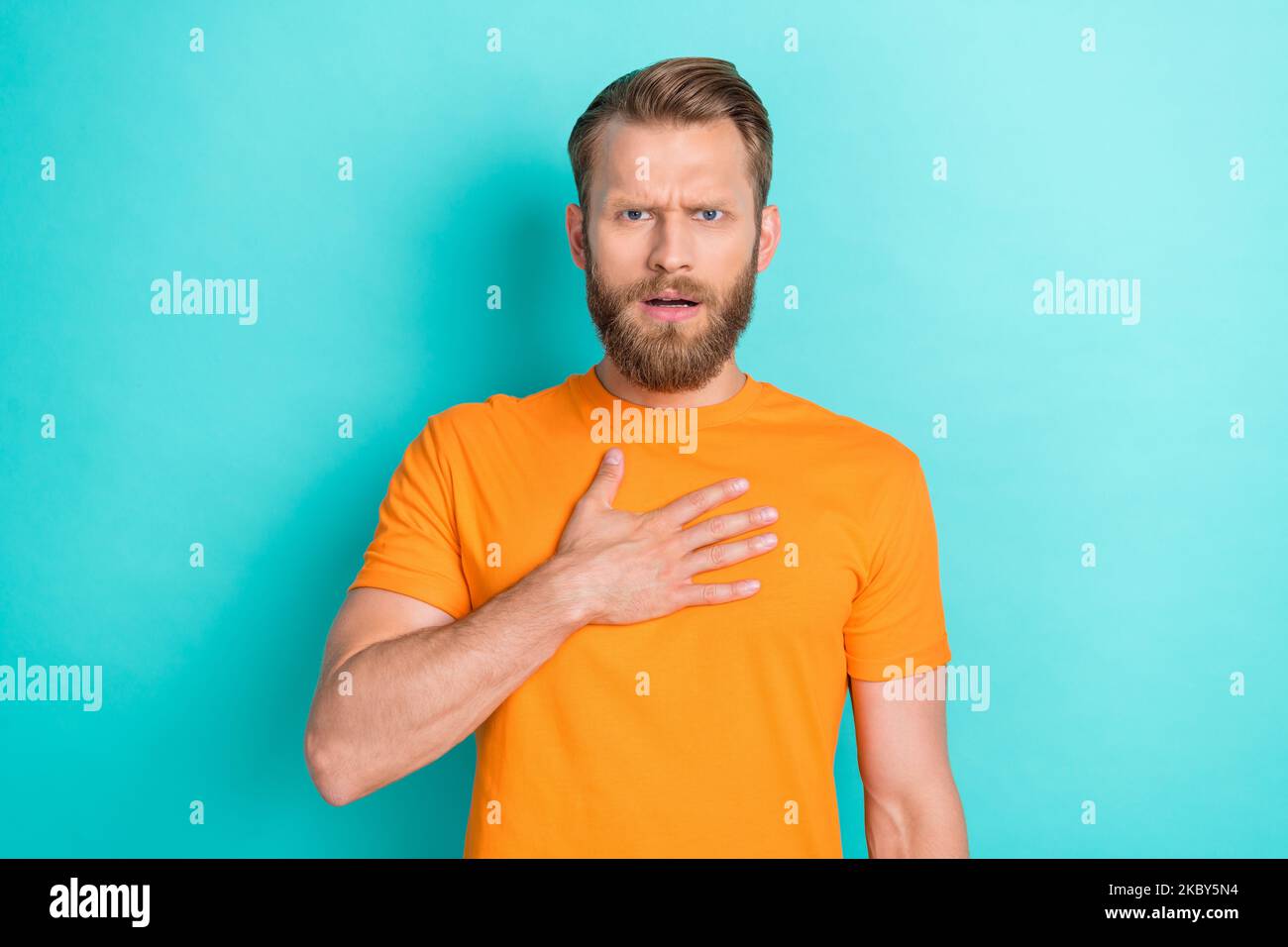 Photo of satisfied shocked person sullen face hand touch chest isolated on turquoise color background Stock Photo