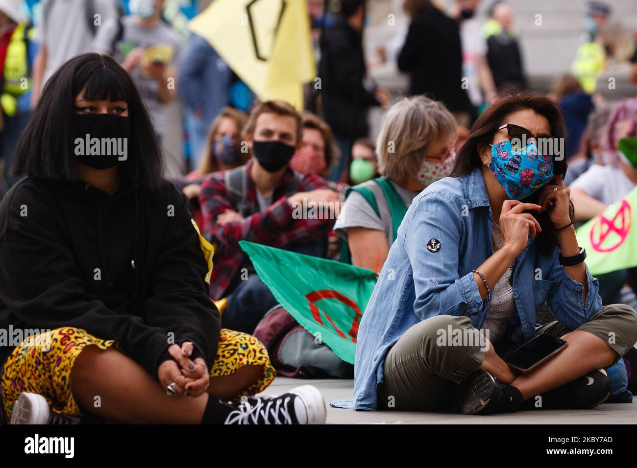 Members of climate change activist movement Extinction Rebellion take part in a 'people's assembly' staged by the group in Trafalgar Square in London, England, on September 5, 2020. The event was later broken up by police under coronavirus powers that limit gatherings to just 30 people, with some activists arrested for refusing to disperse. (Photo by David Cliff/NurPhoto) Stock Photo