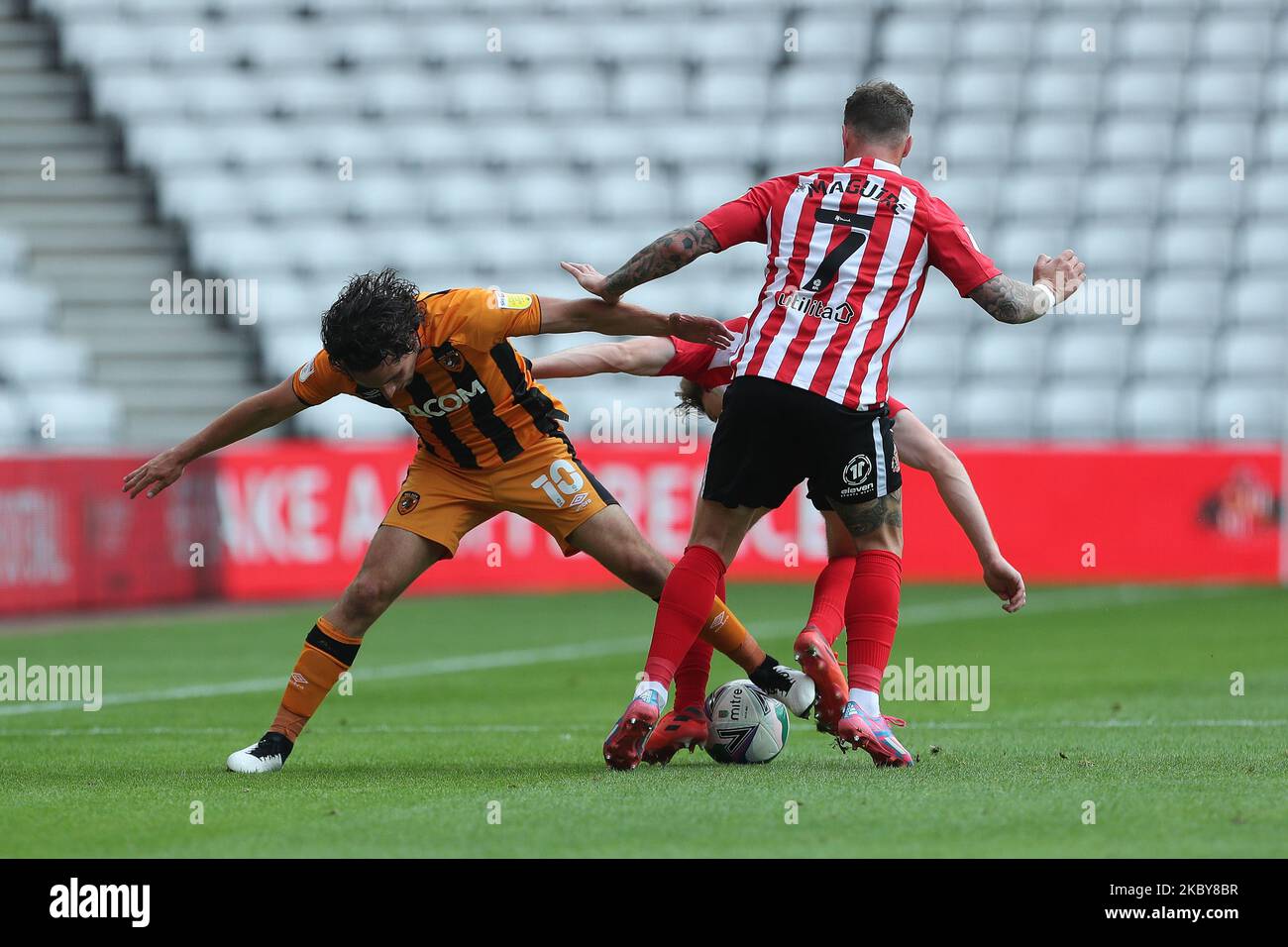 George Honeyman of Hull City in action with Chris Maguire of Sunderland during the Carabao Cup match between Sunderland and Hull City at the Stadium Of Light, Sunderland. (Photo by Mark Fletcher/MI News/NurPhoto) Stock Photo